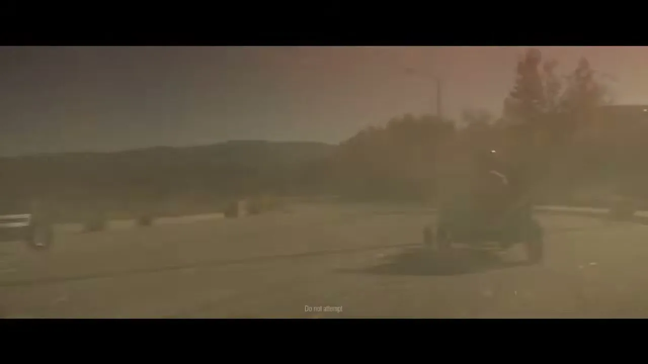 Two children race in homemade go-karts on a dusty suburban street, kicking up dirt as they speed past.