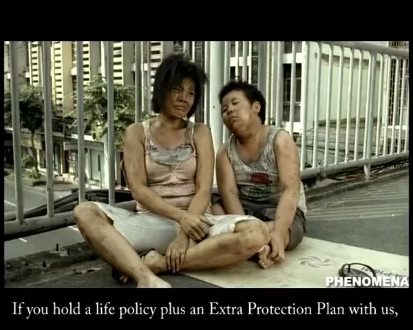 Two dirty, disheveled people, a woman and a child, sit on a concrete bridge, looking distressed as they try to stand up.