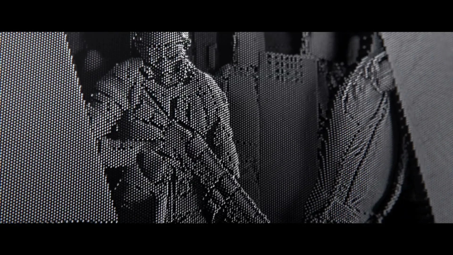 A pin art sculpture of a soldier holding a rifle stands next to a wall, with another figure partially visible on the right.
