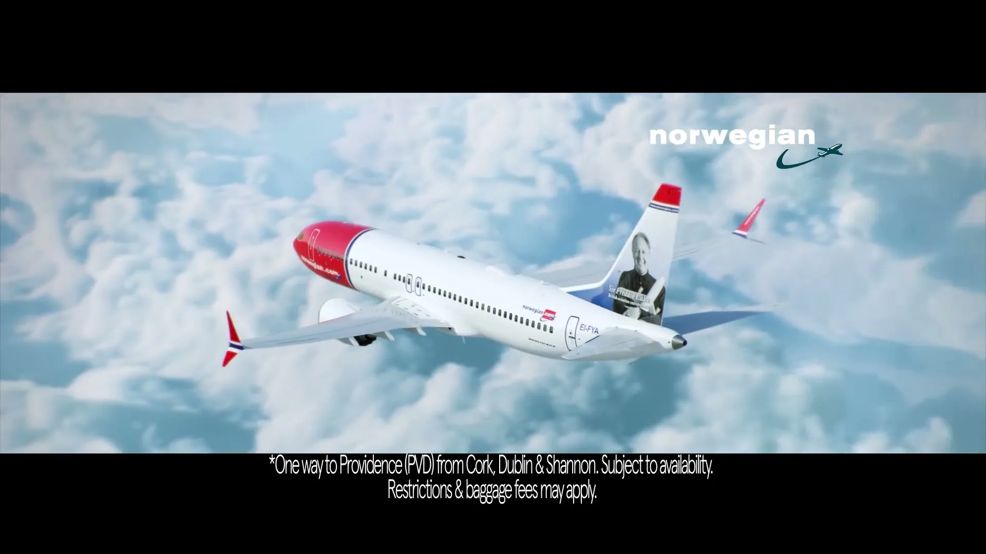 A white Norwegian Air plane with red tail fins and a portrait on its tail flies through a bright blue sky with white clouds.