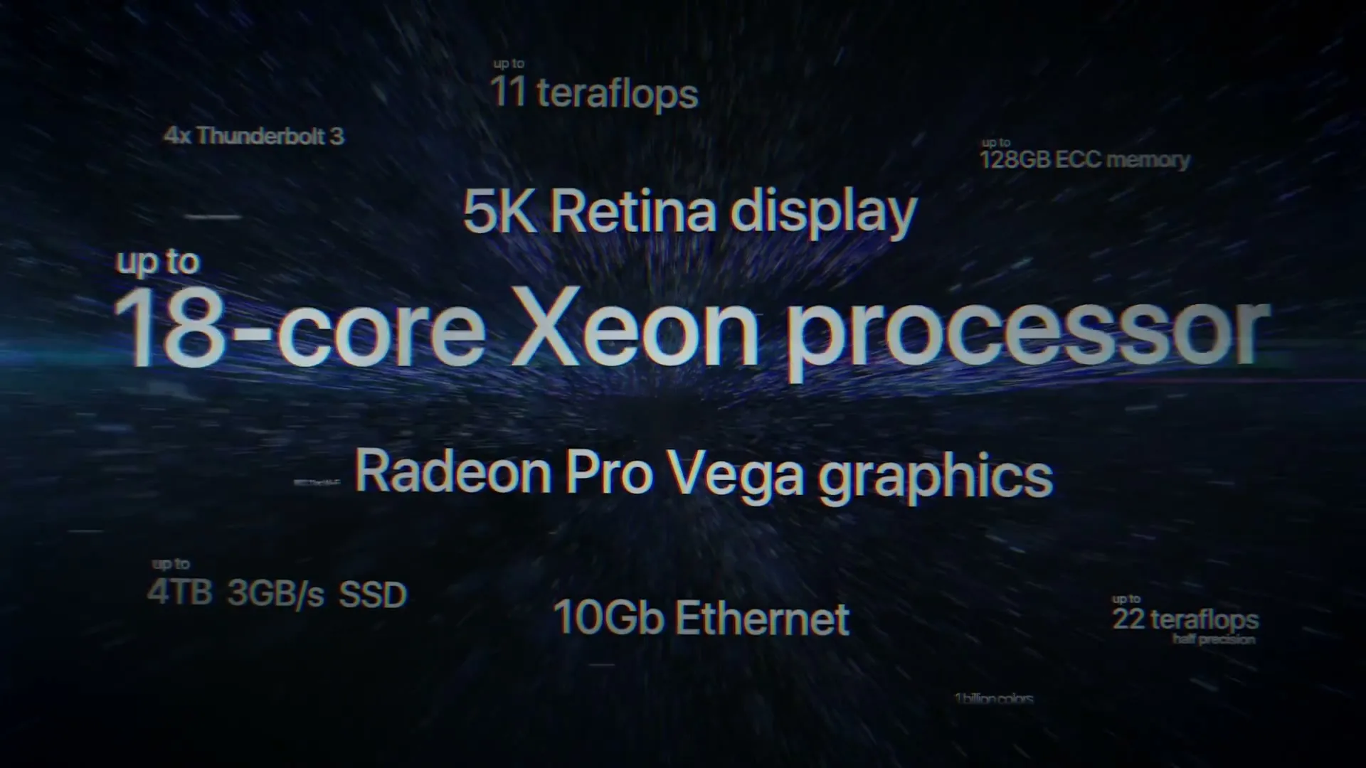 A dark screen with white text displaying various technical specifications for a computer, with a blue light streak across the middle.