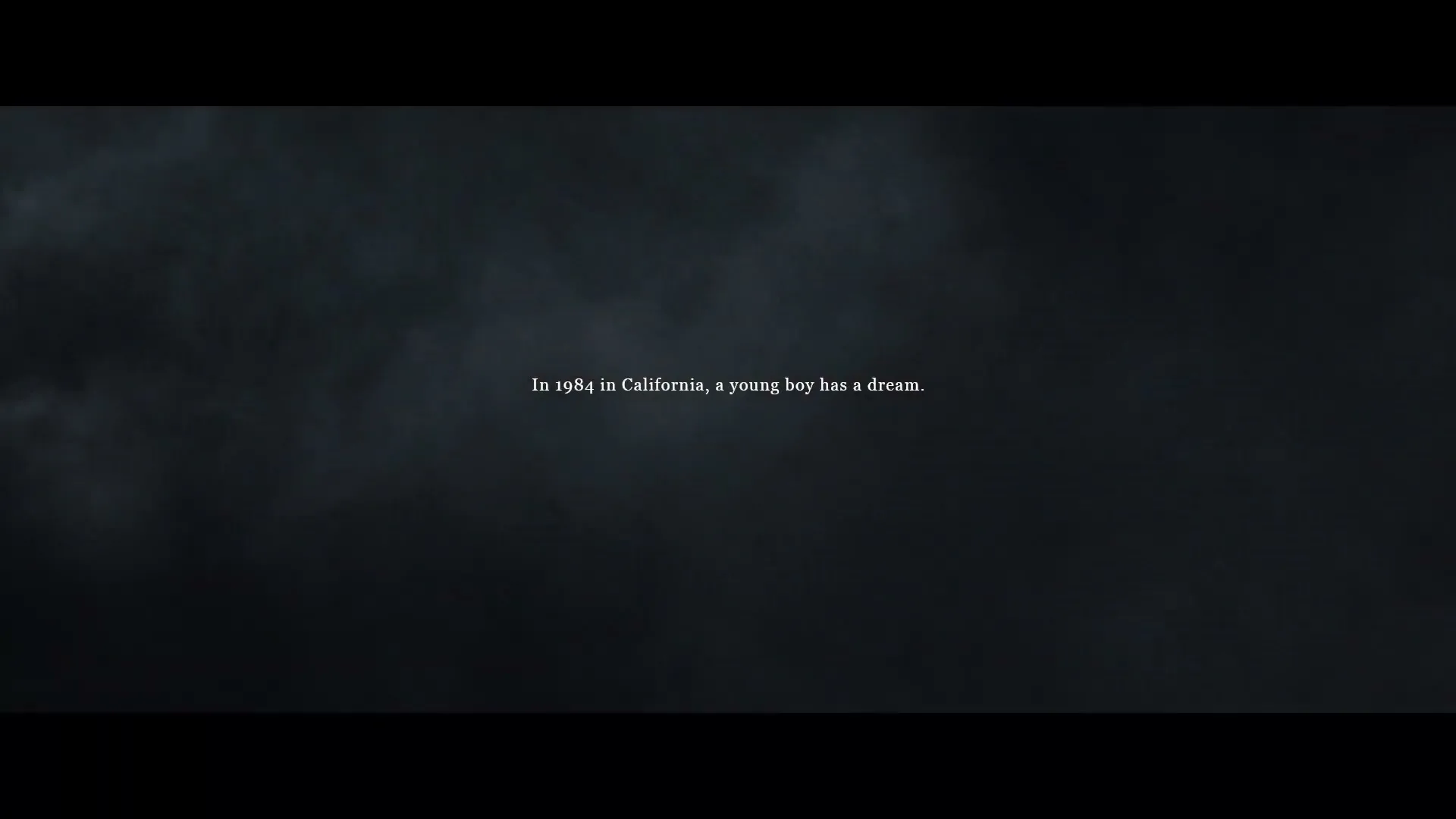 White text appears on a dark, cloudy background, setting the scene for a story about a young boy's dream in 1984 California.