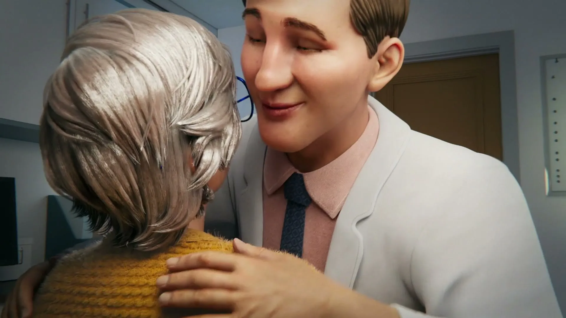 A male doctor with blonde hair and a white lab coat smiles and hugs an elderly woman with white hair in a doctor's office.