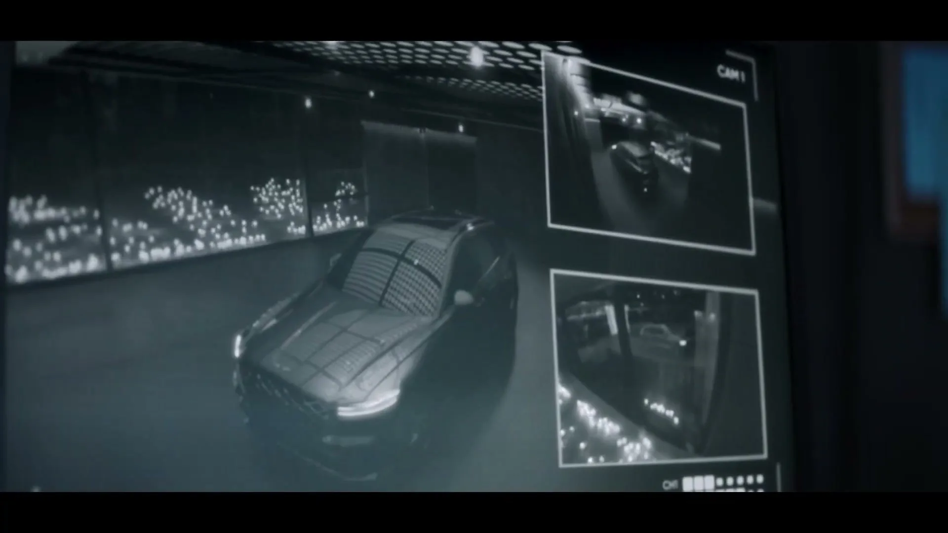 A black and white security monitor displays a luxury car in a garage, with smaller feeds showing other angles, then a bright flash obscures the view.