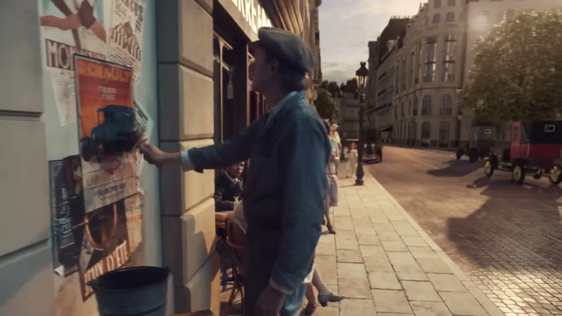 A man in an apron and a woman in a dress are in a rustic kitchen, then the scene transitions to a man posting a flyer outside a cafe in a bustling city street.