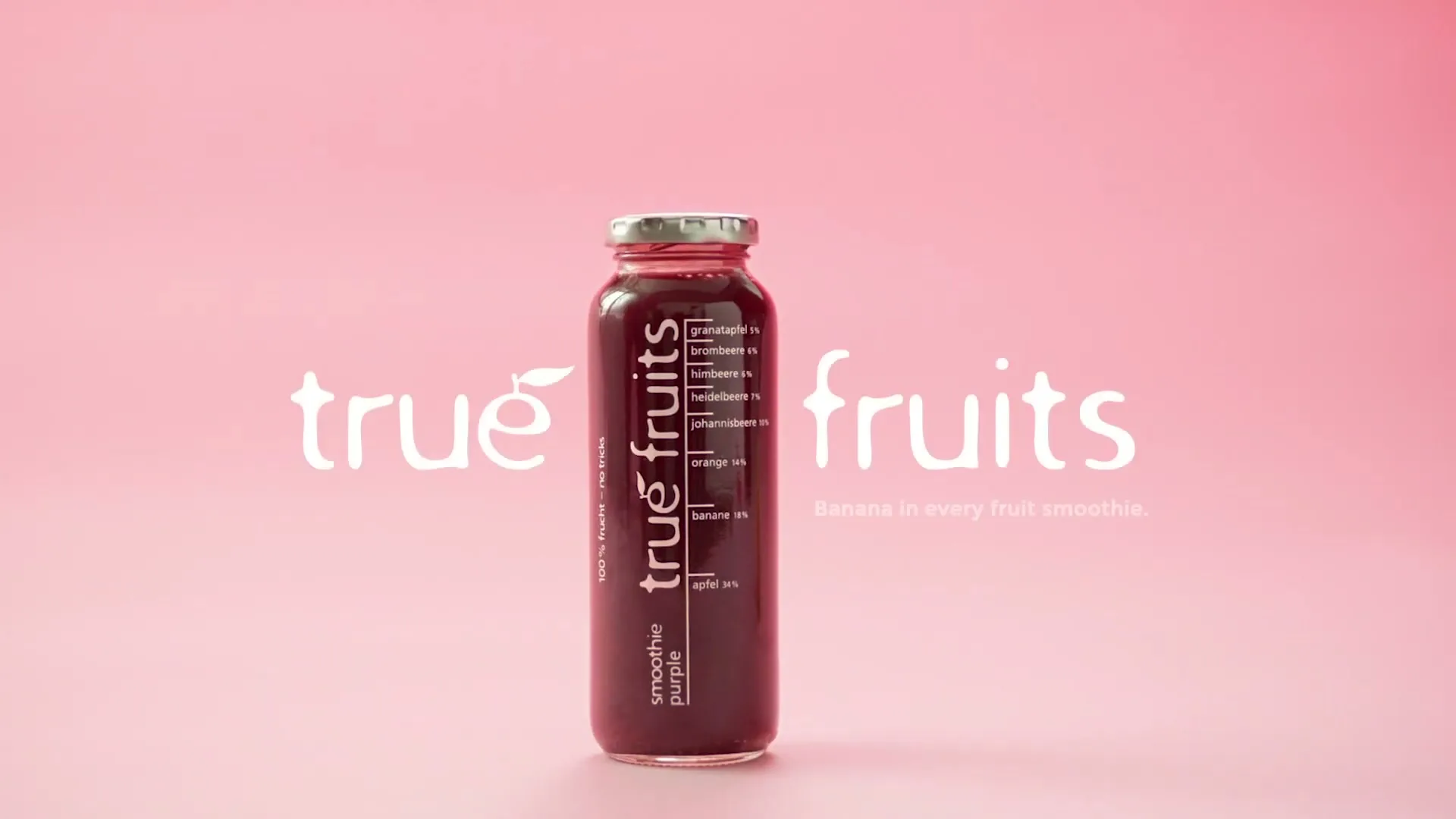 A hand pushes a banana off-screen, then a purple smoothie bottle appears, followed by a pink smoothie bottle, and finally a black smoothie bottle, all on a pink background.
