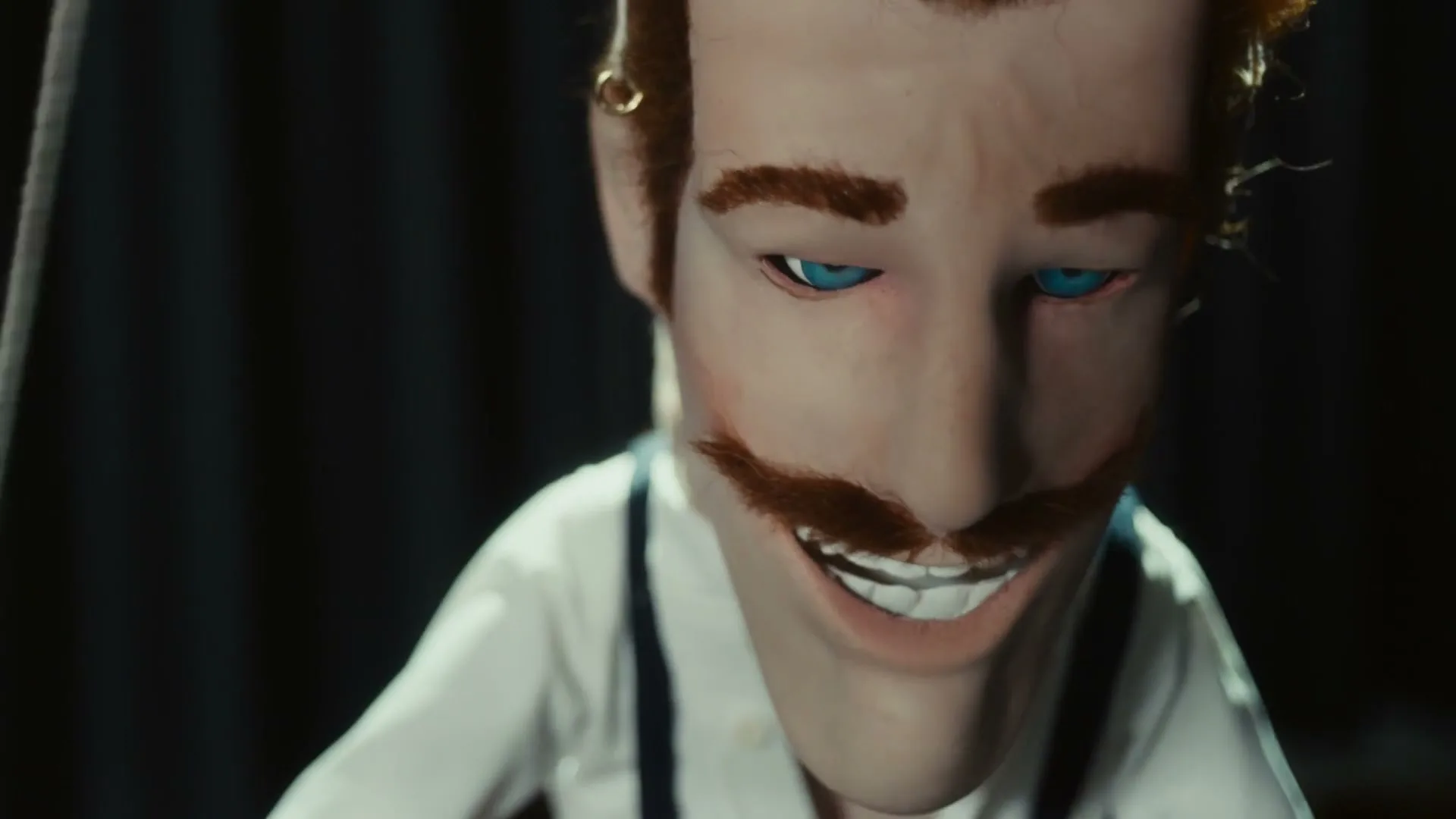 A puppet with red hair, a mustache, and blue eyes smiles while playing a piano, with the text "The Internet of S**t Song" overlaid.