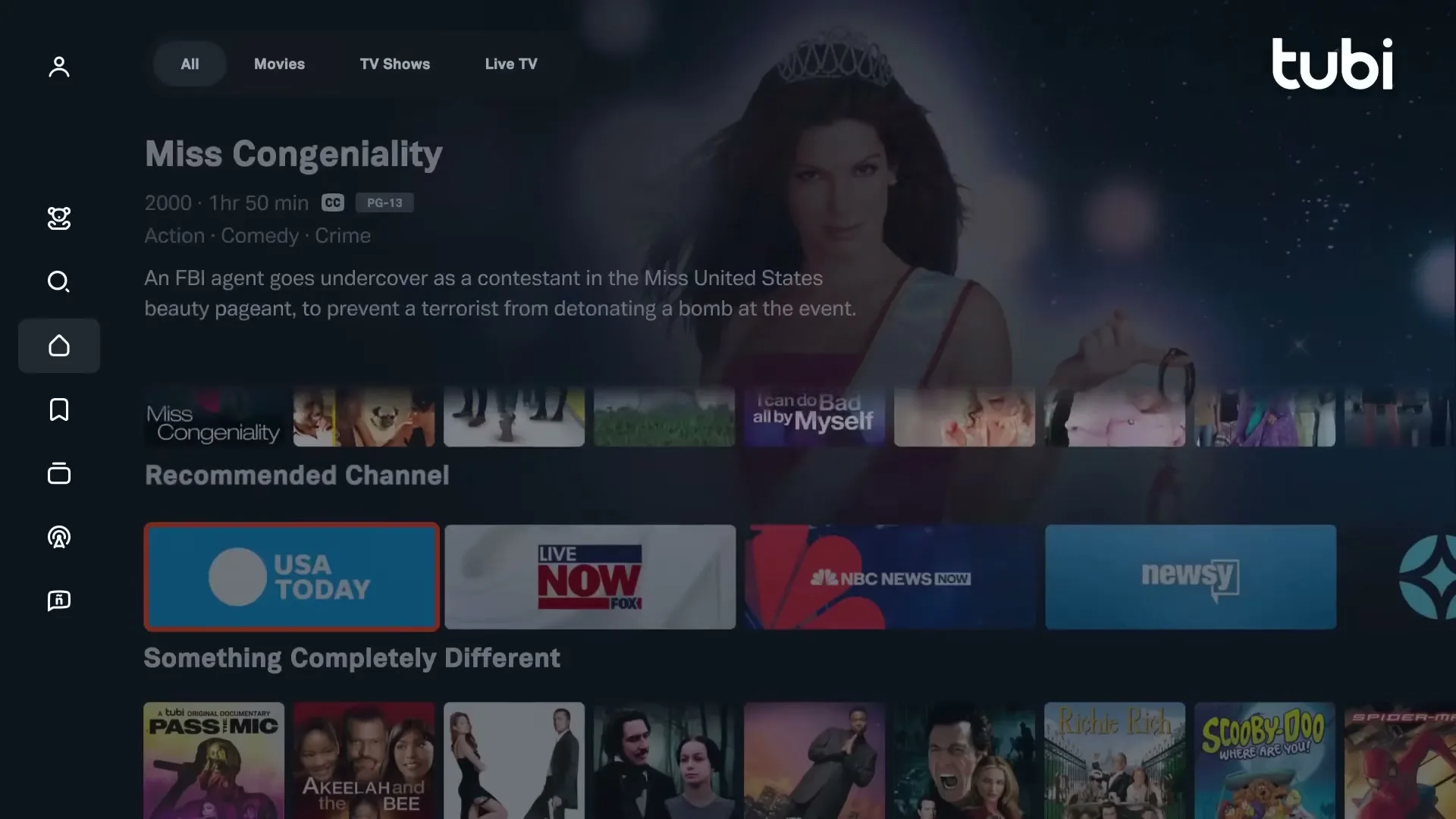 A close-up shot of a TV screen displaying the Tubi streaming service interface, with various movie and TV show titles visible.