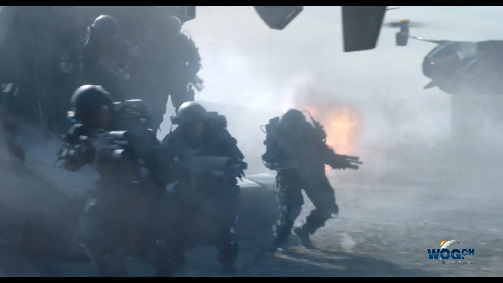 Heavily armed soldiers in tactical gear jump out of a futuristic aircraft onto a dusty battlefield as an explosion erupts behind them.