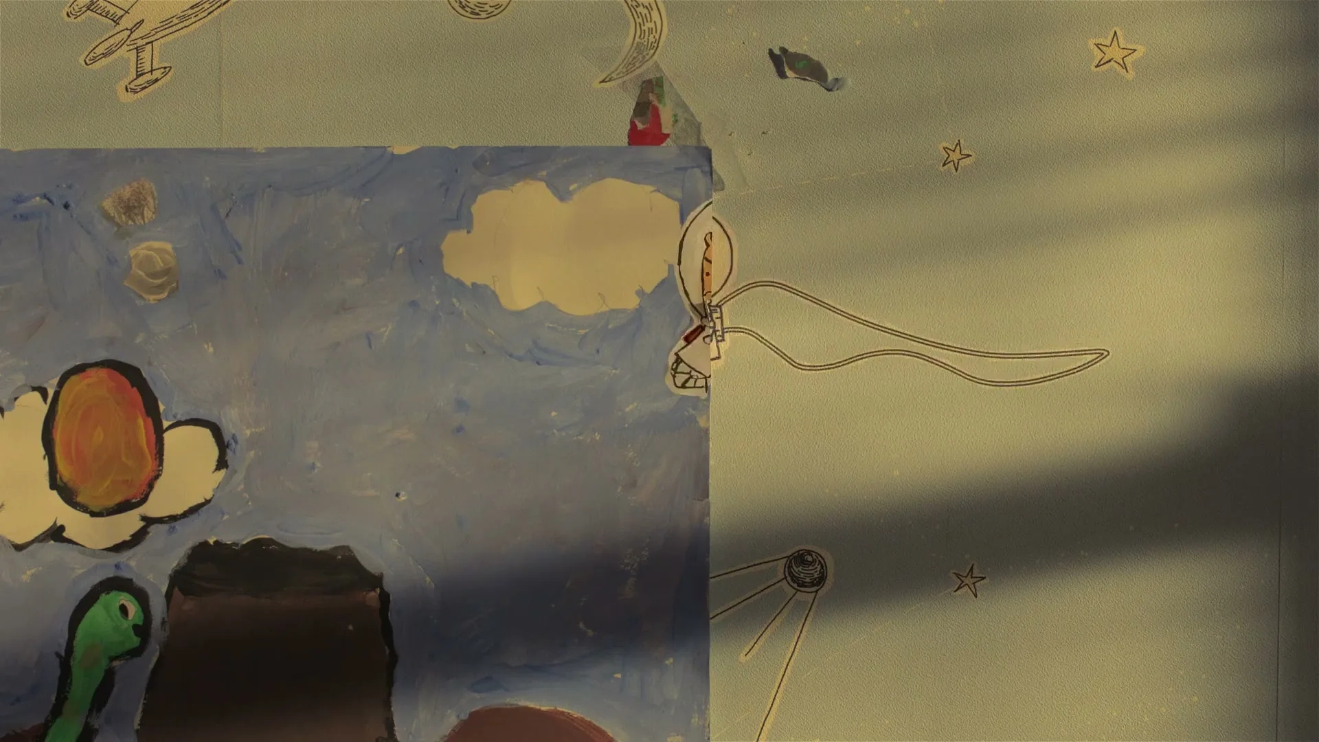 A cutout animation of a male astronaut floats in space, tethered to a painted blue sky with clouds and a green turtle.