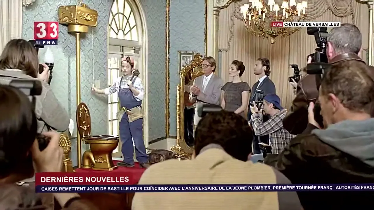 A young female plumber in overalls stands next to a golden toilet, surrounded by a crowd of photographers and reporters in a lavish room.