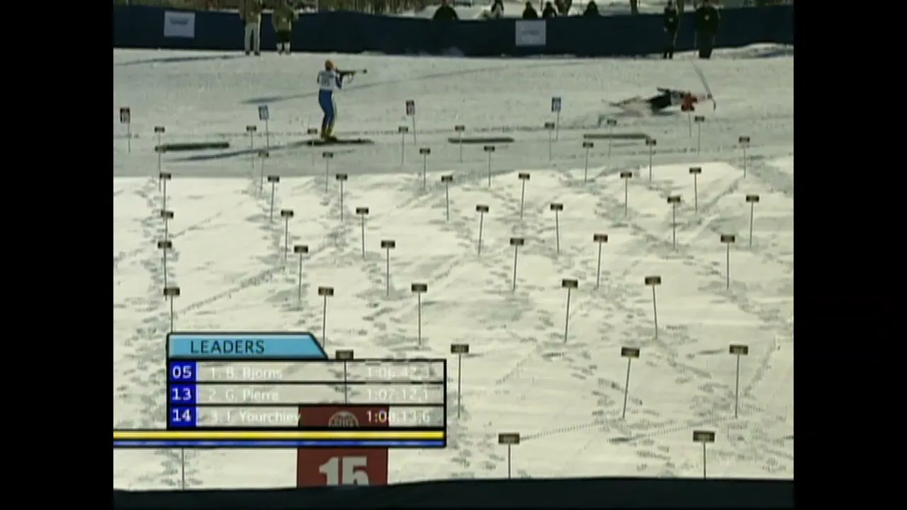 A biathlete in blue and white skis and shoots a rifle at targets on a snowy field, while another biathlete in red falls in the background.