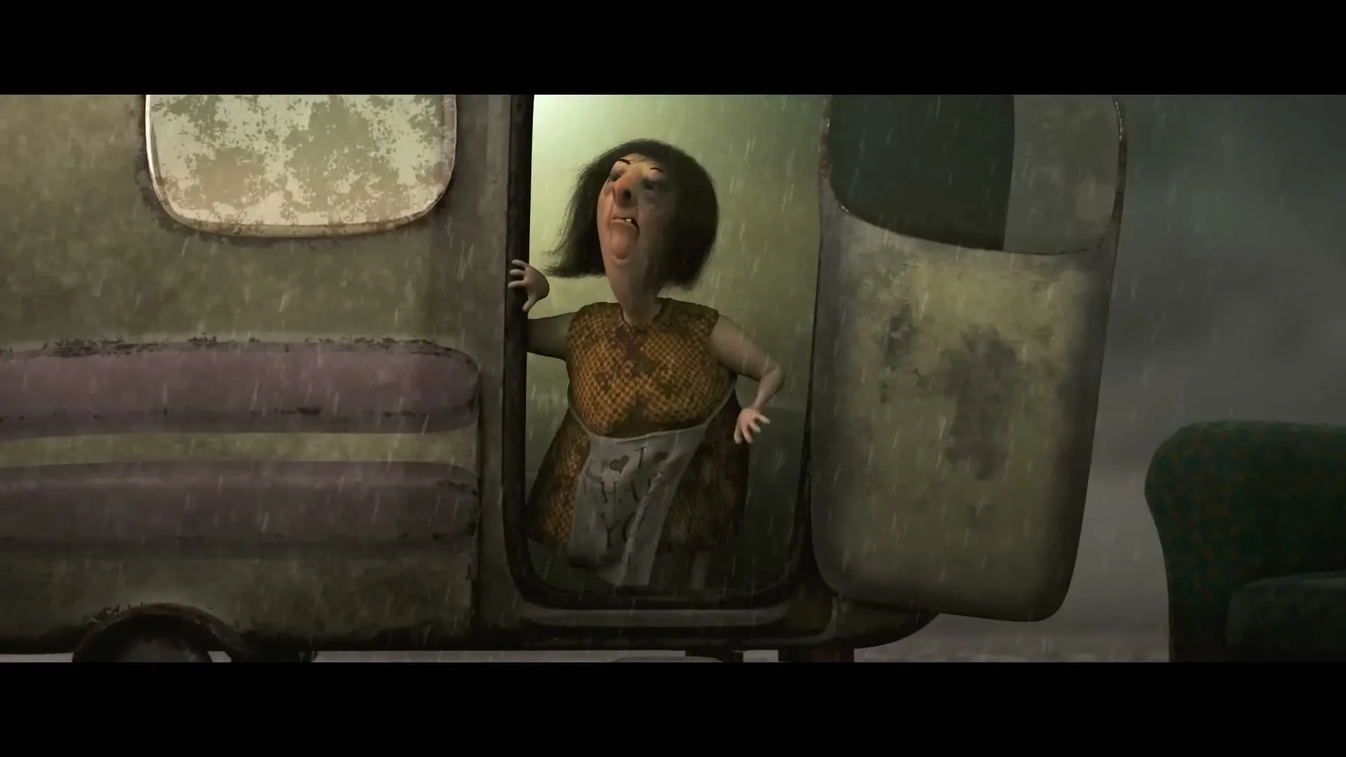 An animated, disheveled woman with dark hair and a tattered dress stands in the doorway of a dilapidated trailer, holding a sign that says "I HAD YOU, PLEASE" in the rain.