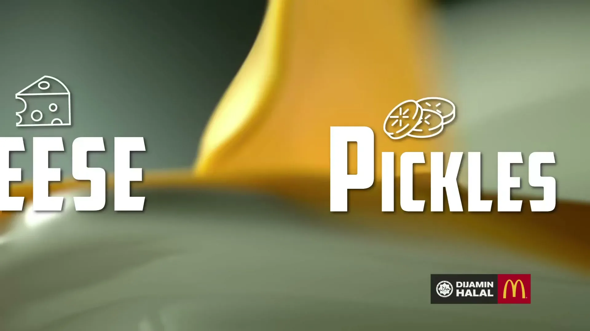 The word "CHEESE" with a cheese icon appears, then slides left as "PICKLES" with a pickle icon slides in from the right, against a blurred yellow and grey background.