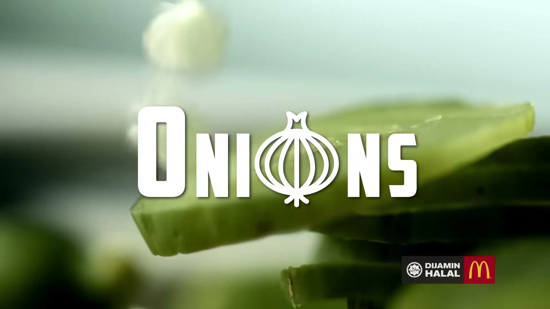 White text "Pickles" and "Onions" with corresponding icons appear over a blurred background of green pickle slices.