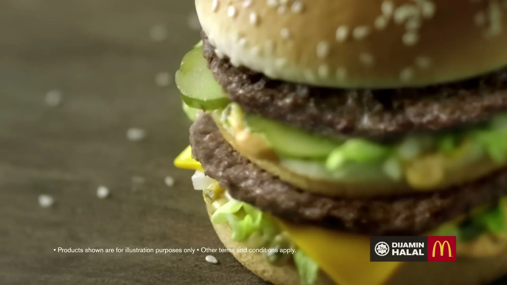 A close-up shot of a McDonald's Big Mac, showcasing its layers of patties, cheese, lettuce, and pickles, with salt flakes scattered on a wooden surface.
