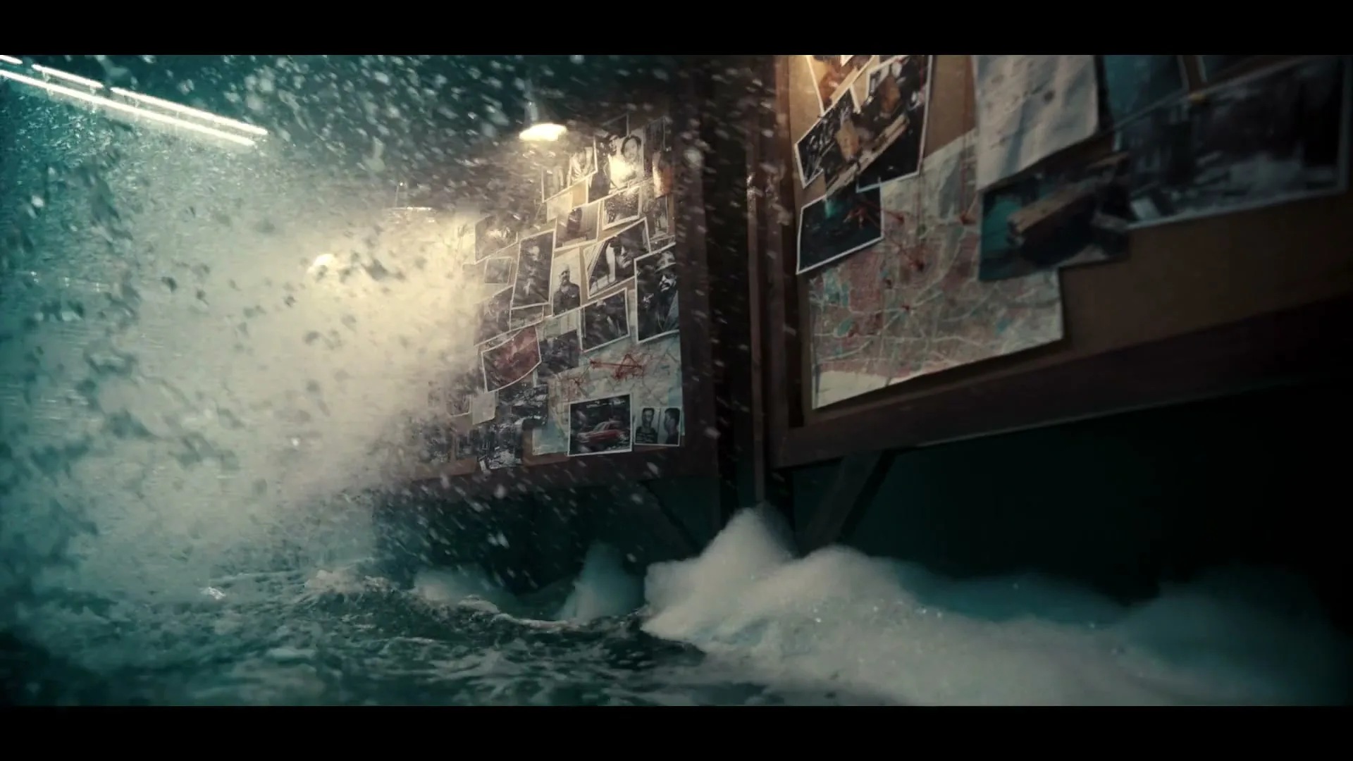 Water splashes over a detective's office, submerging the floor and covering a corkboard filled with photos and maps.