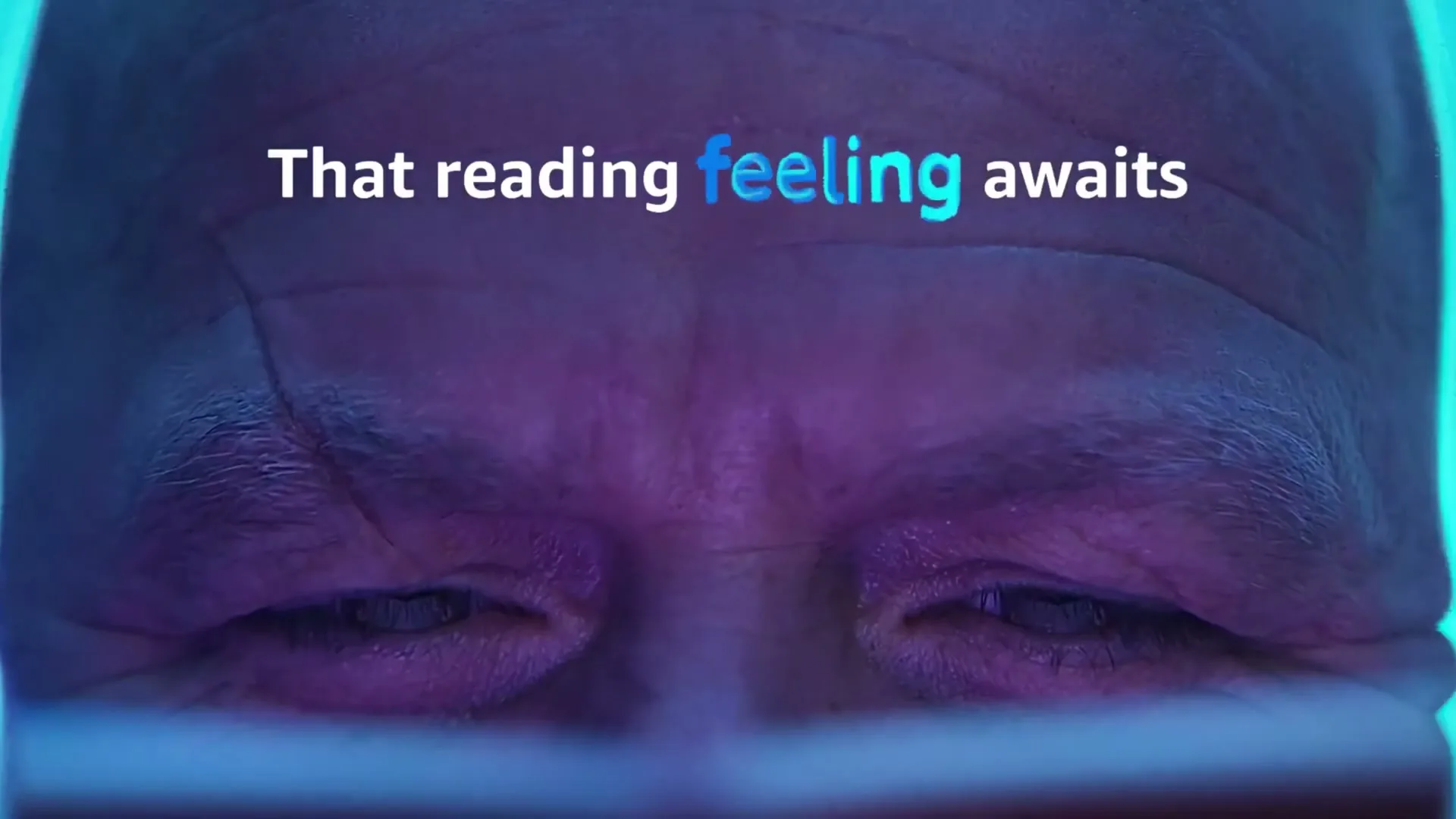 A person's face is shown in a closeup, with their eyes closed, as text appears on screen in a vibrant blue and purple light.