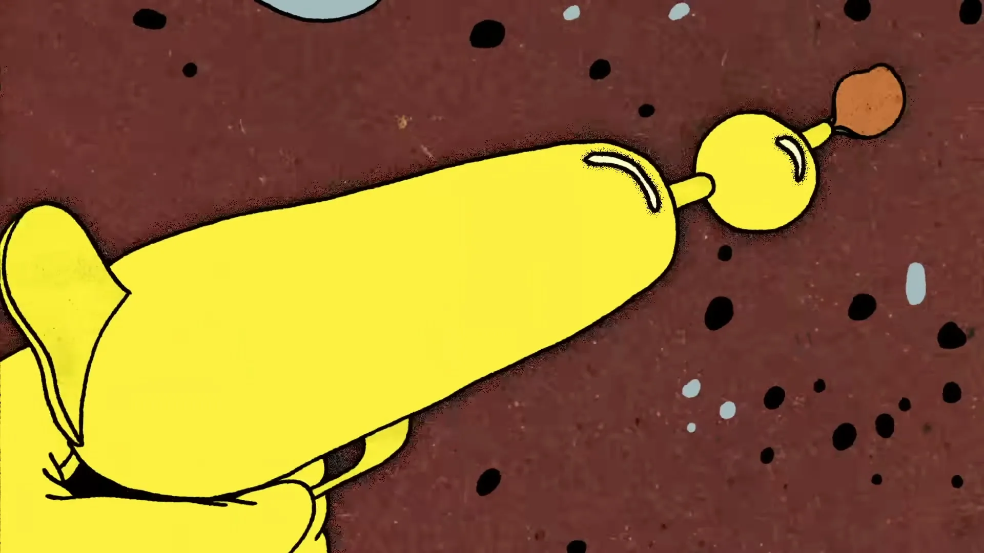 A yellow hand holds a yellow balloon animal shaped like a gun, which then transforms into a red rocket flying through a green and orange landscape.