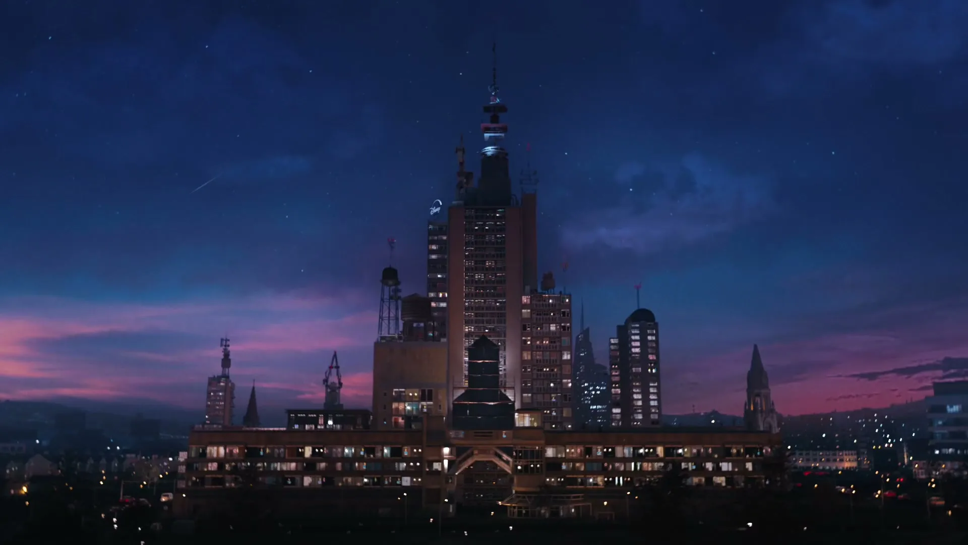 An aerial shot of a city at dusk, with a large, ornate building in the center, and the Disney logo appearing in the sky.