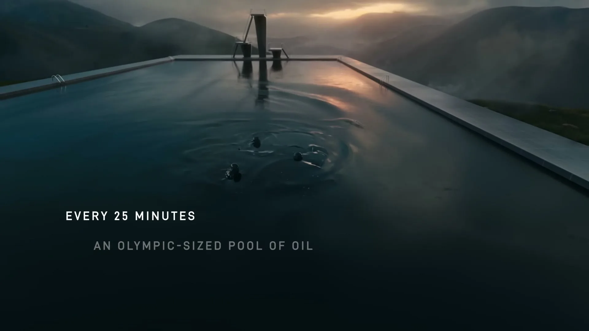 An infinity pool in a mountainous landscape at dusk, with dark liquid dripping into it, creating ripples.