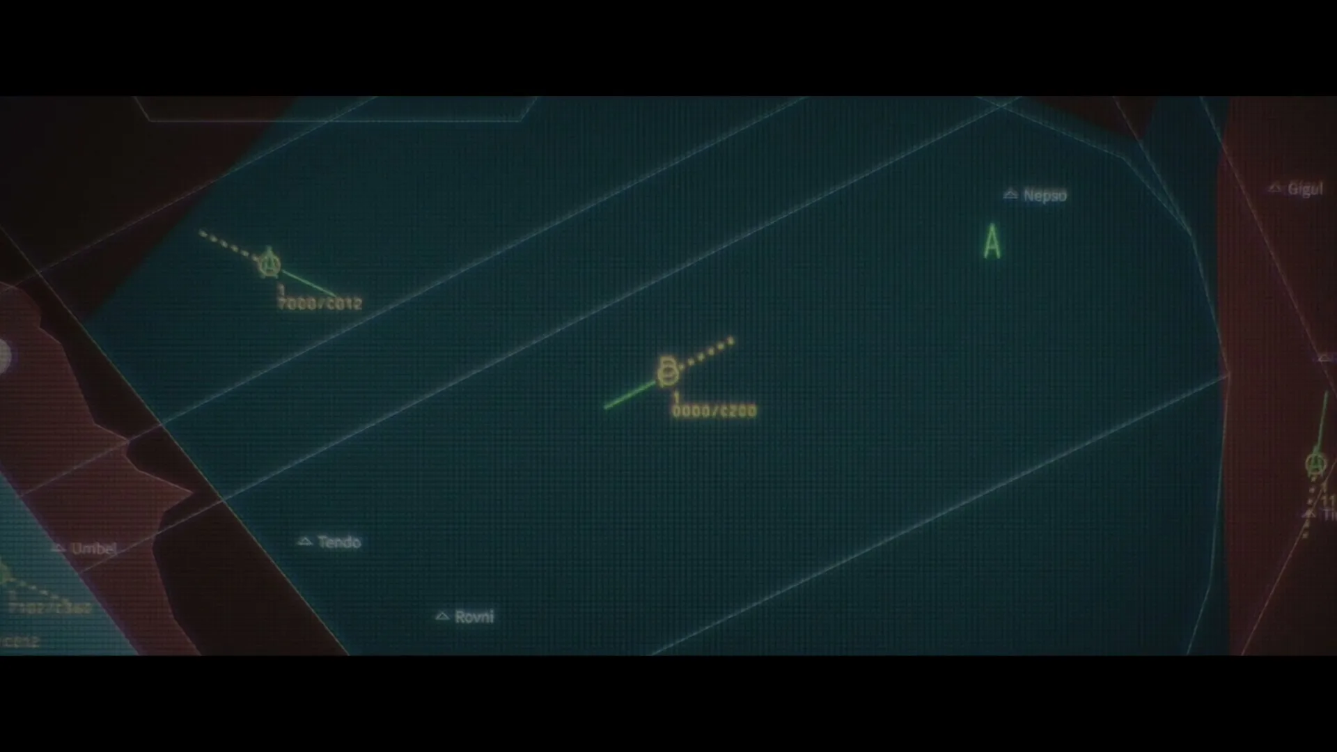 A digital map with green and orange lines and text on a dark background, showing a radar or navigation screen.