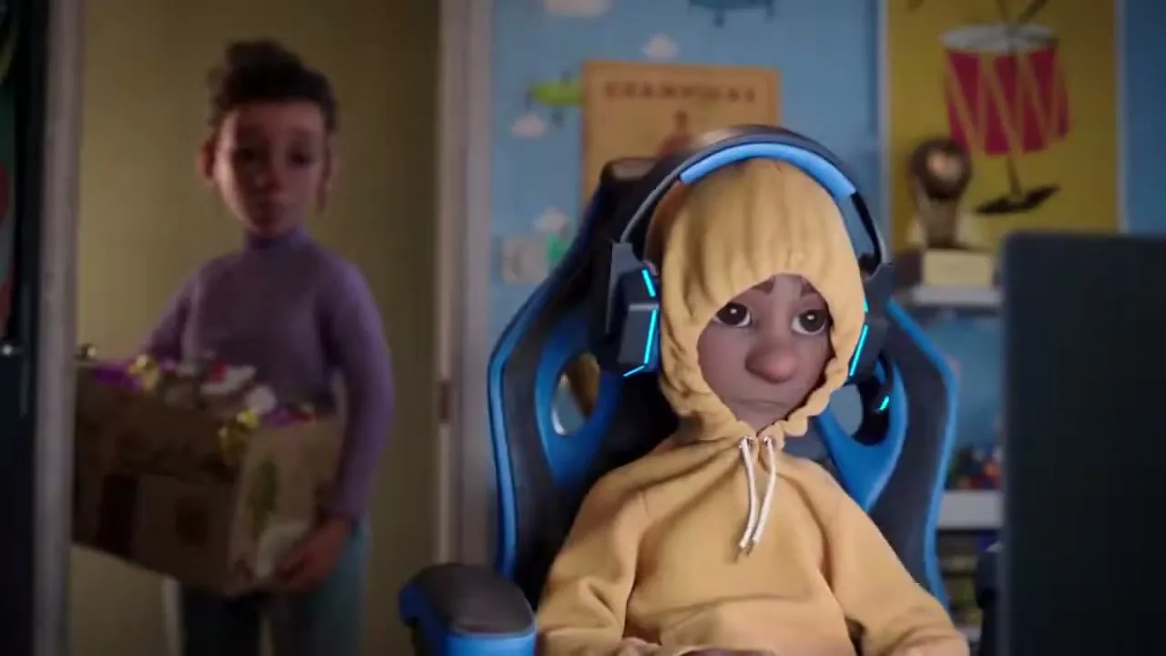 A young woman with curly hair holds a box of decorations, looking at a boy in a yellow hoodie and gaming headset, who is sitting in a gaming chair in his bedroom.