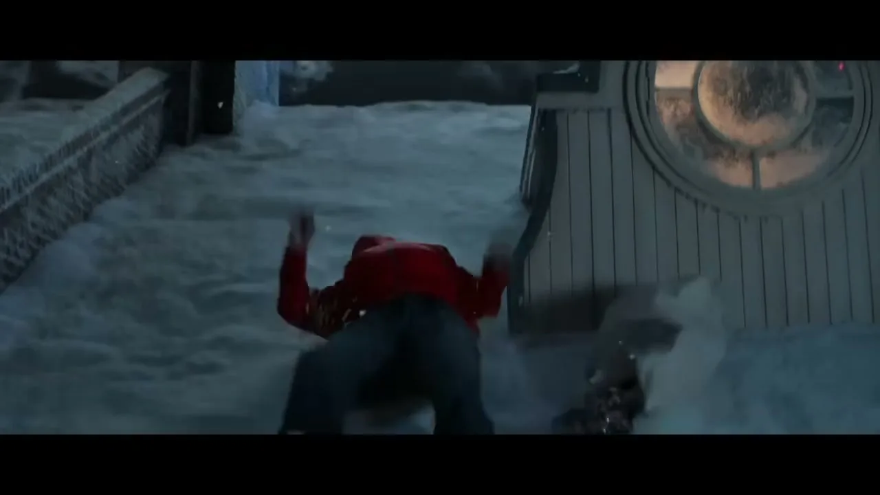 A burglar in a red jacket and dark pants tumbles down a snow-covered roof next to a round window with Christmas lights, dropping a sack and a tablet.
