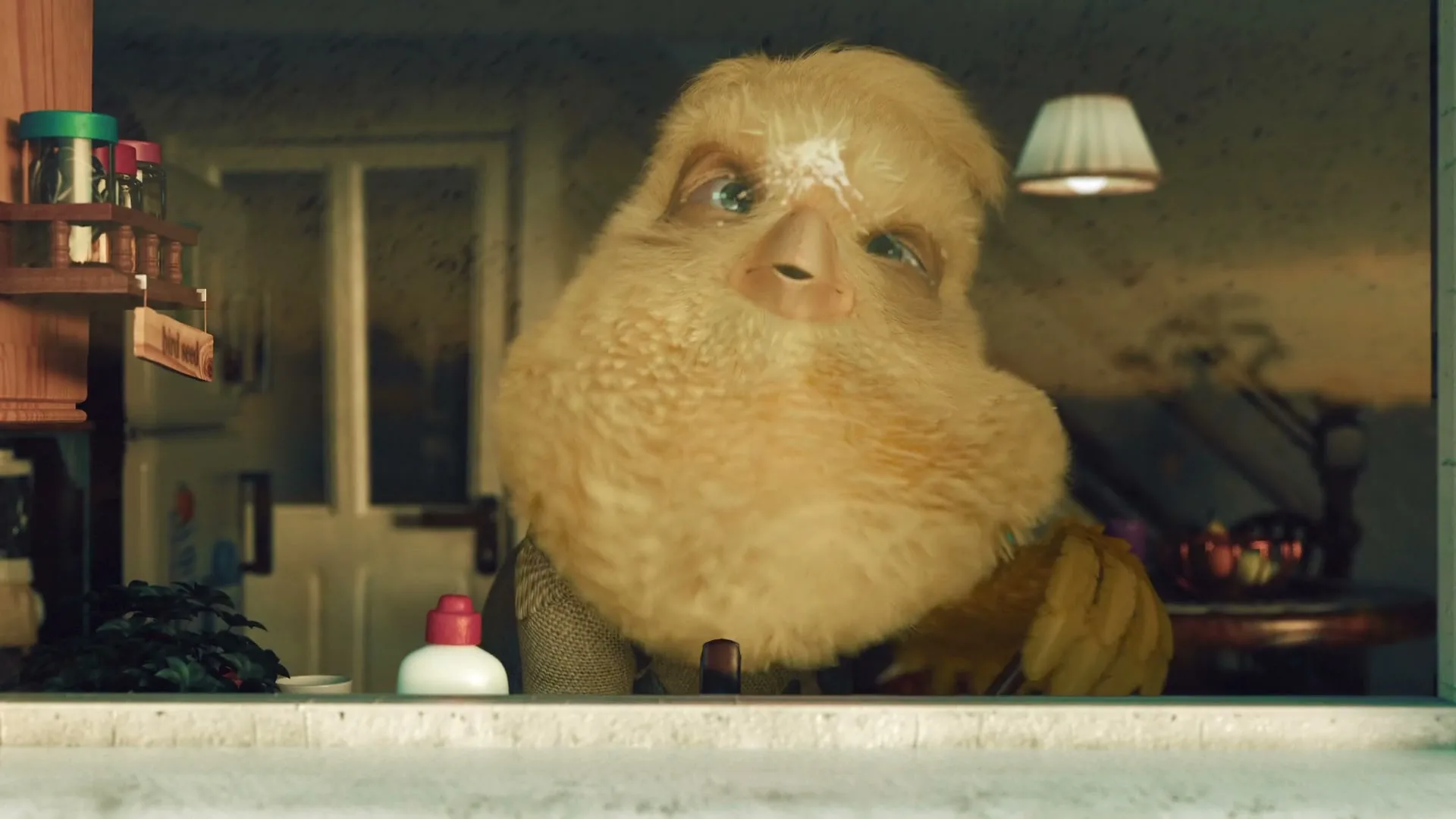 A fluffy, yellow, bird-like creature with green eyes looks through a dirty window, then quickly moves away from the frame.