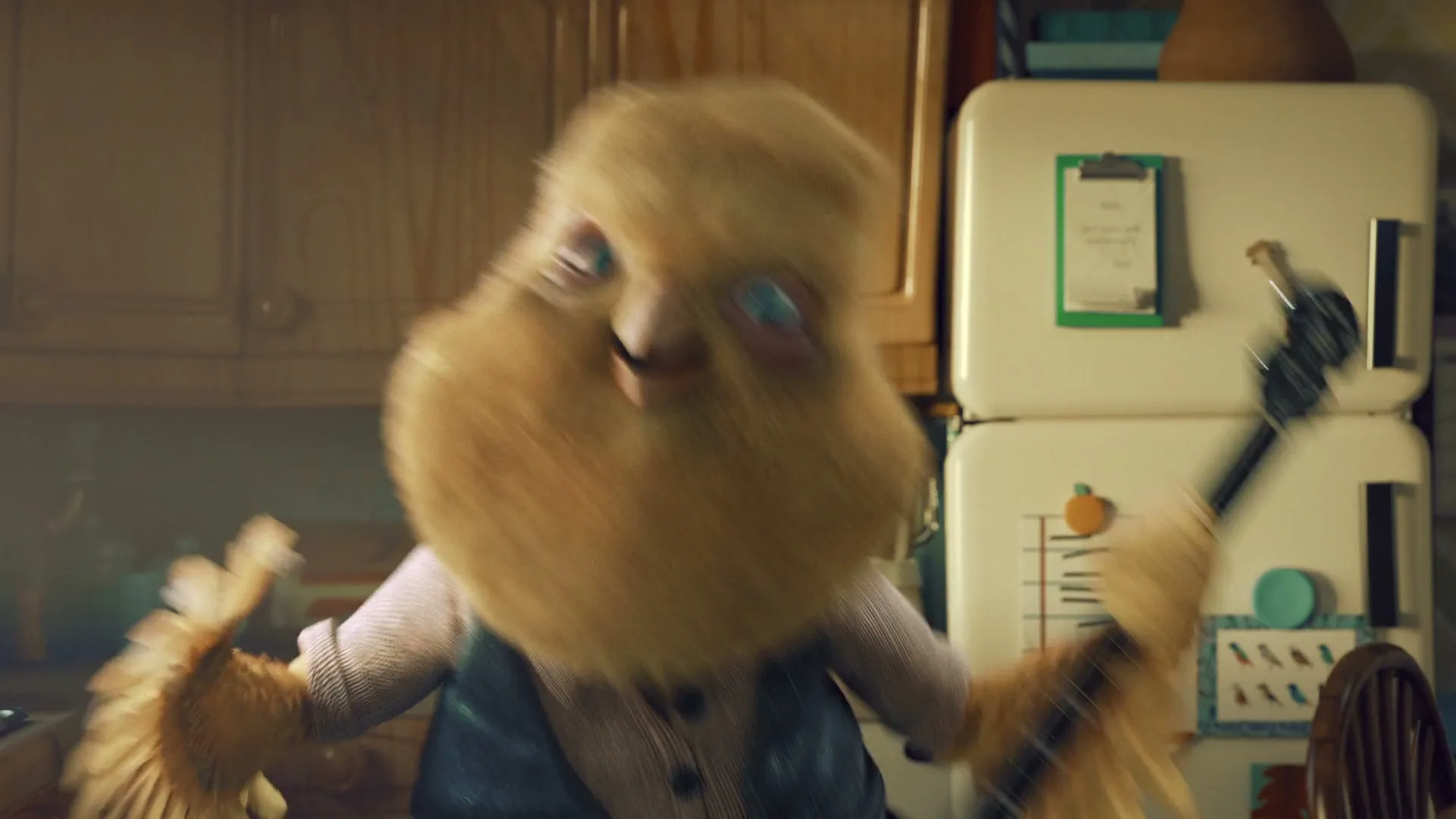 A fluffy yellow bird-like creature with a banjo sings and dances in a kitchen, with a refrigerator in the background.