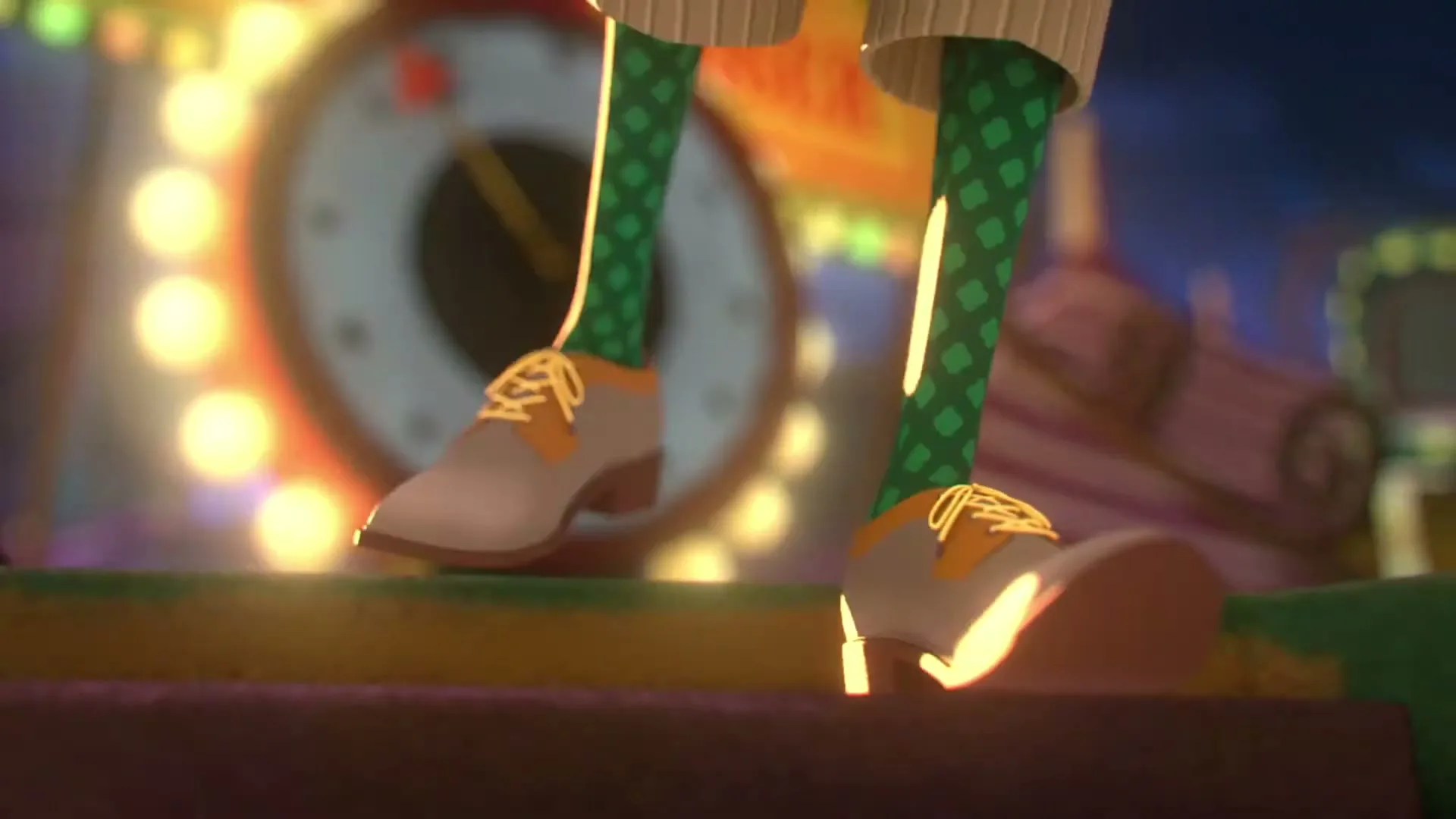 A person's feet in white pants, green socks, and brown shoes walk on a colorful stage with bright lights in the background.