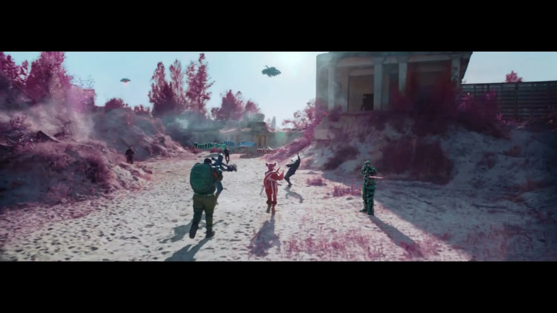 A group of people in a desert-like landscape with pink trees and buildings are running as an explosion occurs behind them, with alien ships in the sky.