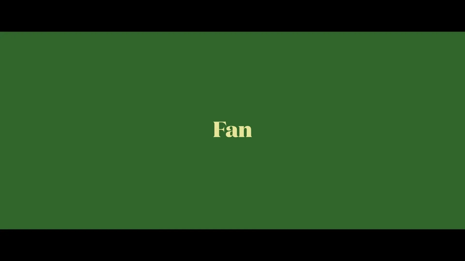 The word "Fan" appears in a serif font on a solid green background, introducing the commercial's theme.
