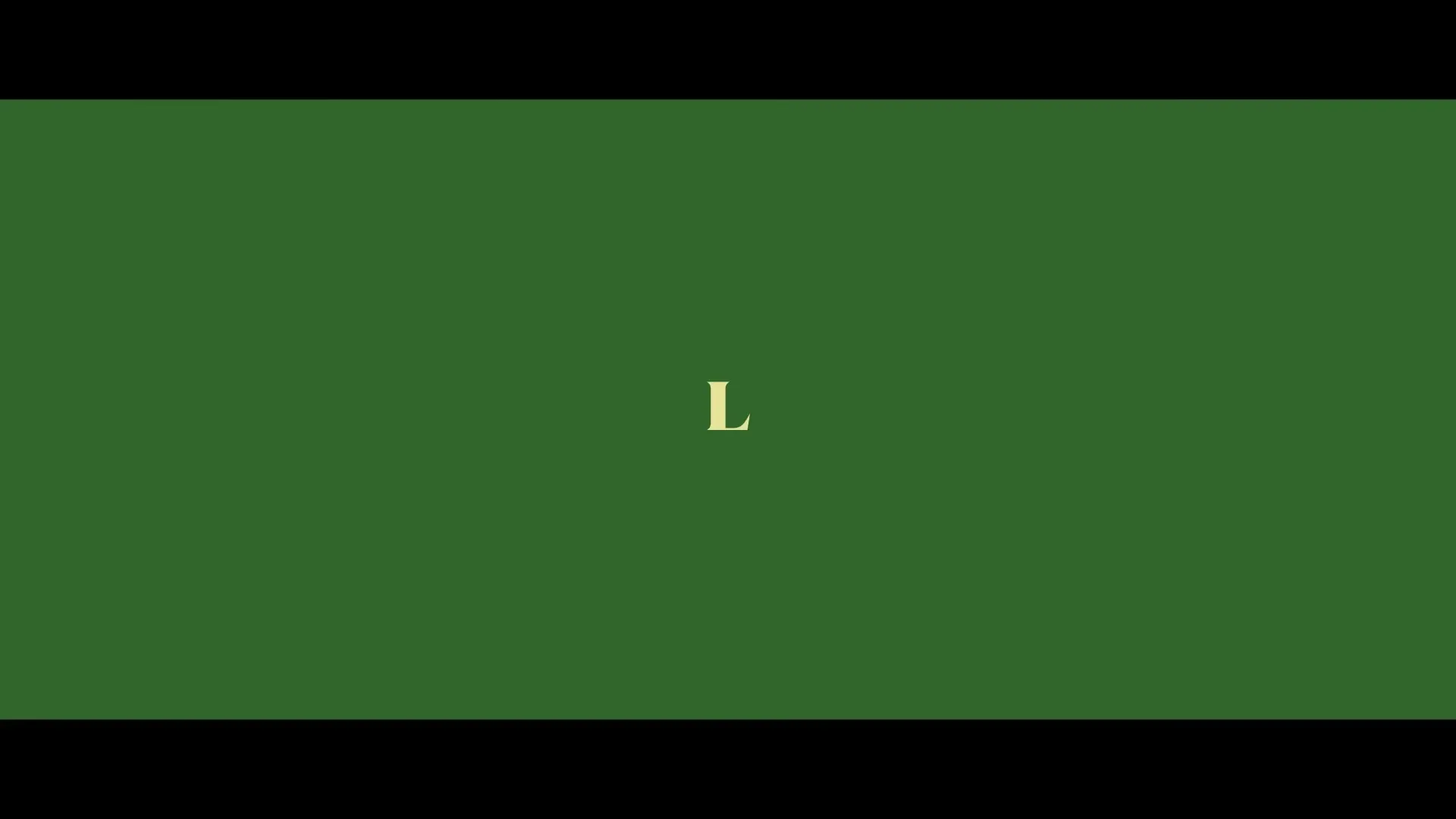 A single golden letter "L" is centered on a solid green background, appearing as a title card.