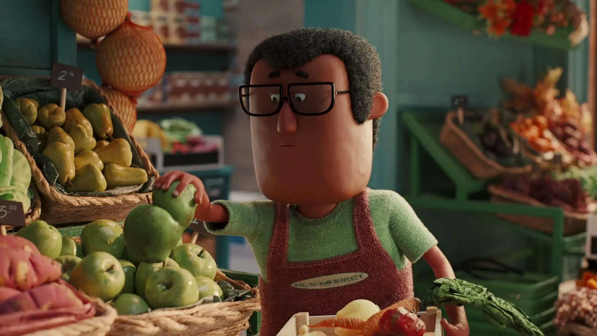 A male animated character with glasses and an apron picks up a green apple from a basket of produce in a brightly lit grocery store.