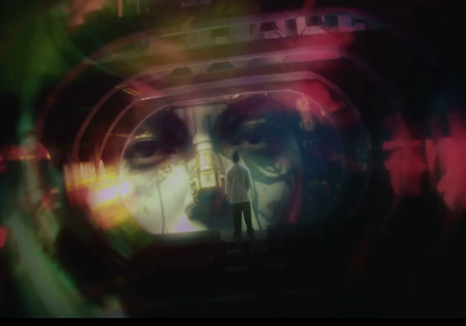 A man stands in a dark, futuristic tunnel, looking at a large, abstract face projected on a screen, then a white car with headlights on appears in darkness.