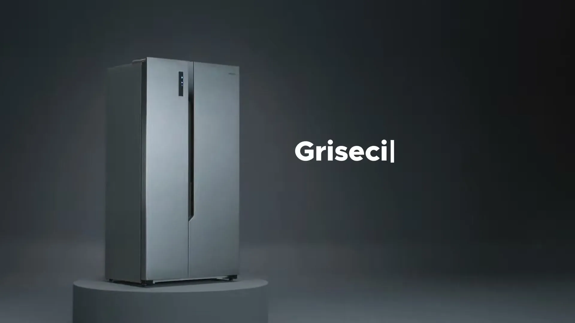 A silver Philco refrigerator stands on a gray pedestal in a studio, with text appearing on the right side of the screen.