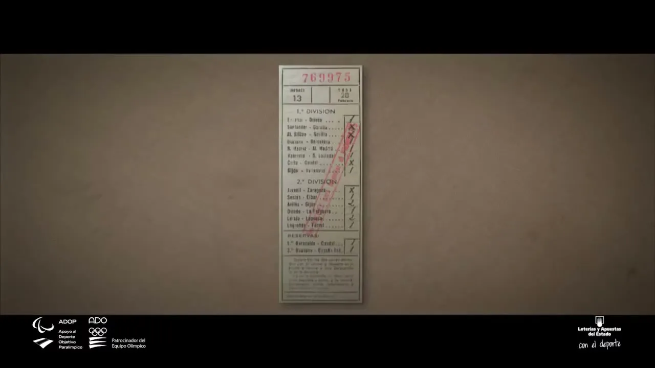 A vintage Quiniela football betting slip with handwritten marks is shown on a plain background, with a red number 769975 at the top.