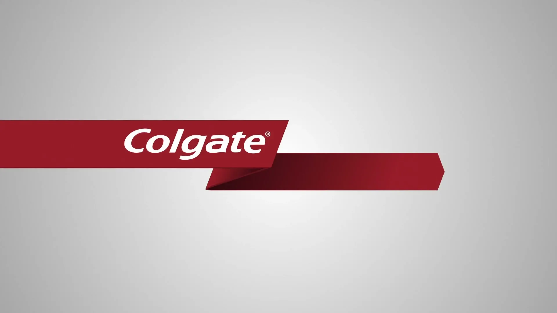 The Colgate logo appears on a red ribbon against a white background, with a subtle gradient.