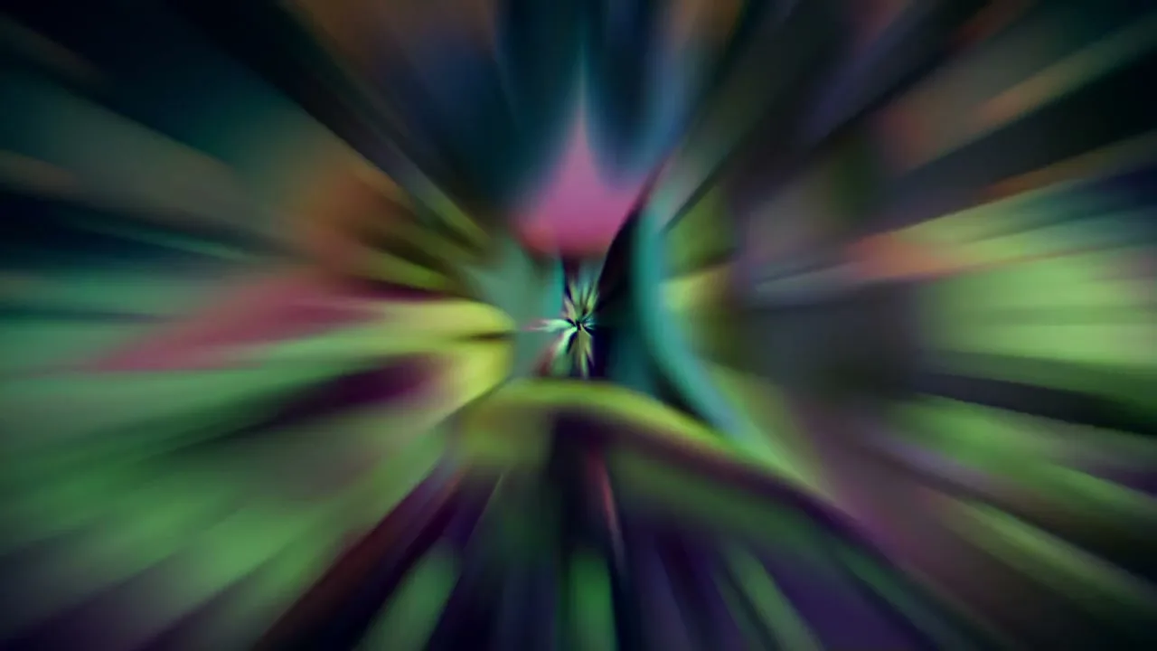 A colorful, abstract animation with a dark background and bright, swirling shapes that resemble a flower or a kaleidoscope.