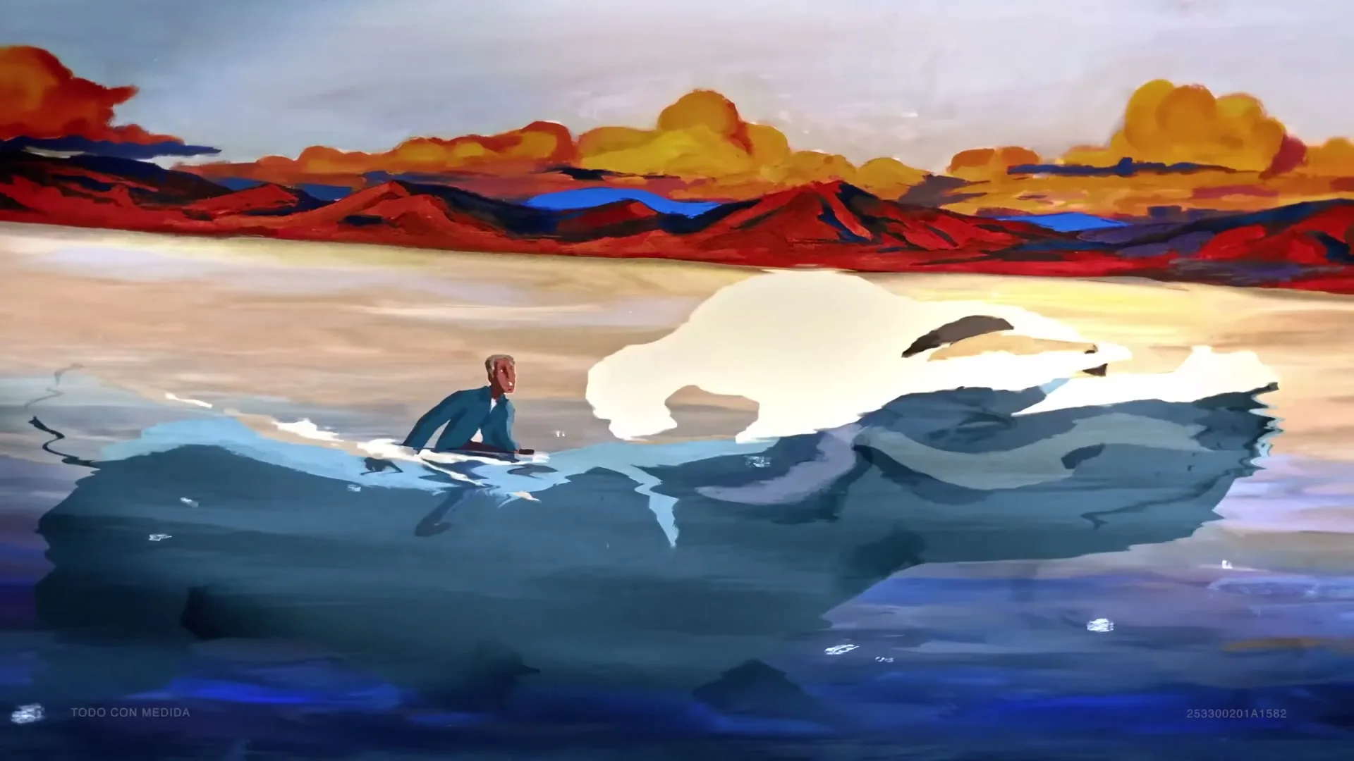 A man in a blue shirt and brown pants paddles a small boat on a body of water, with a large dog emerging from the water beside him, against a backdrop of colorful mountains and sky.
