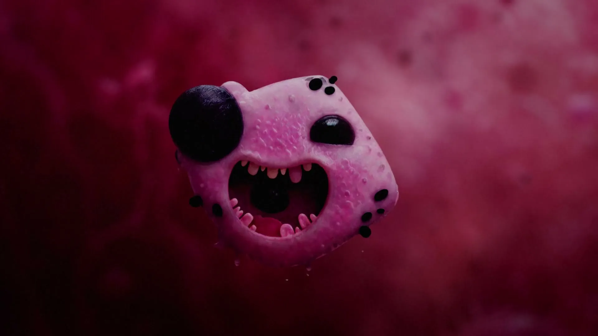 A pink, blob-like creature with large black eyes and a wide mouth changes shape and stretches in a dark pink, abstract environment.