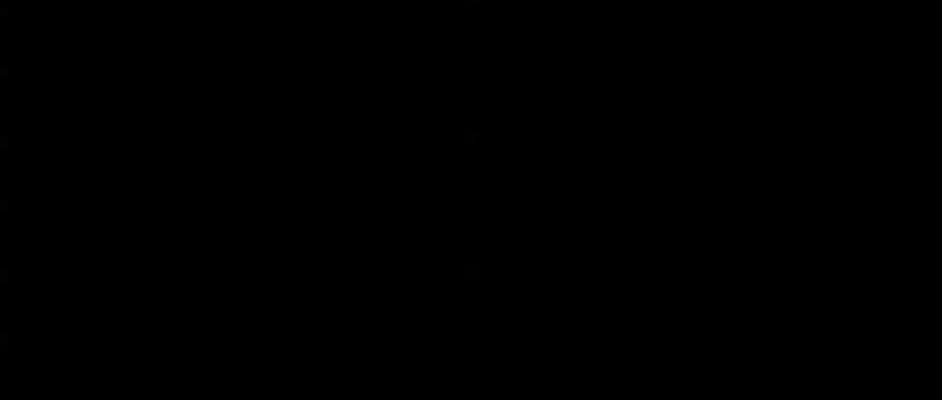 A black screen with no visible content or people, indicating a transition or a moment of darkness.