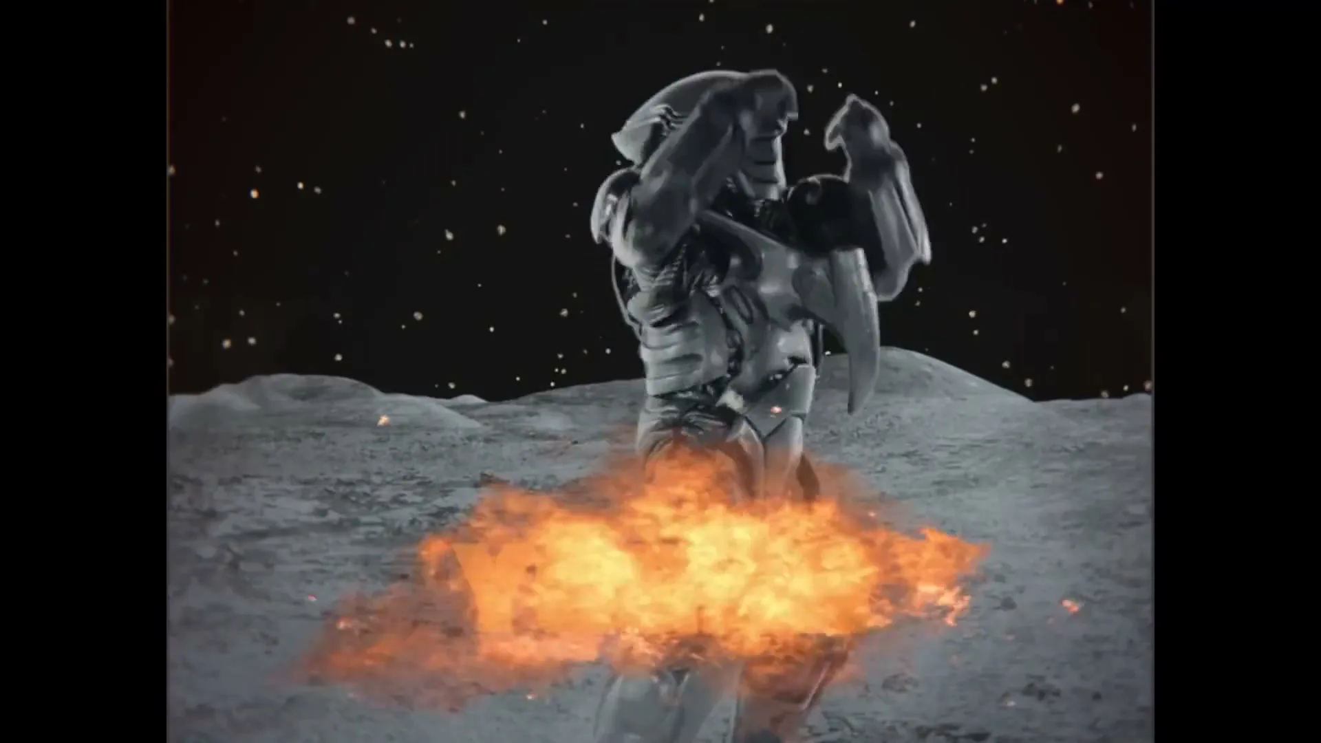 A futuristic armored figure stands on a moon-like surface, a fiery explosion erupting around its waist, then turns to reveal text.