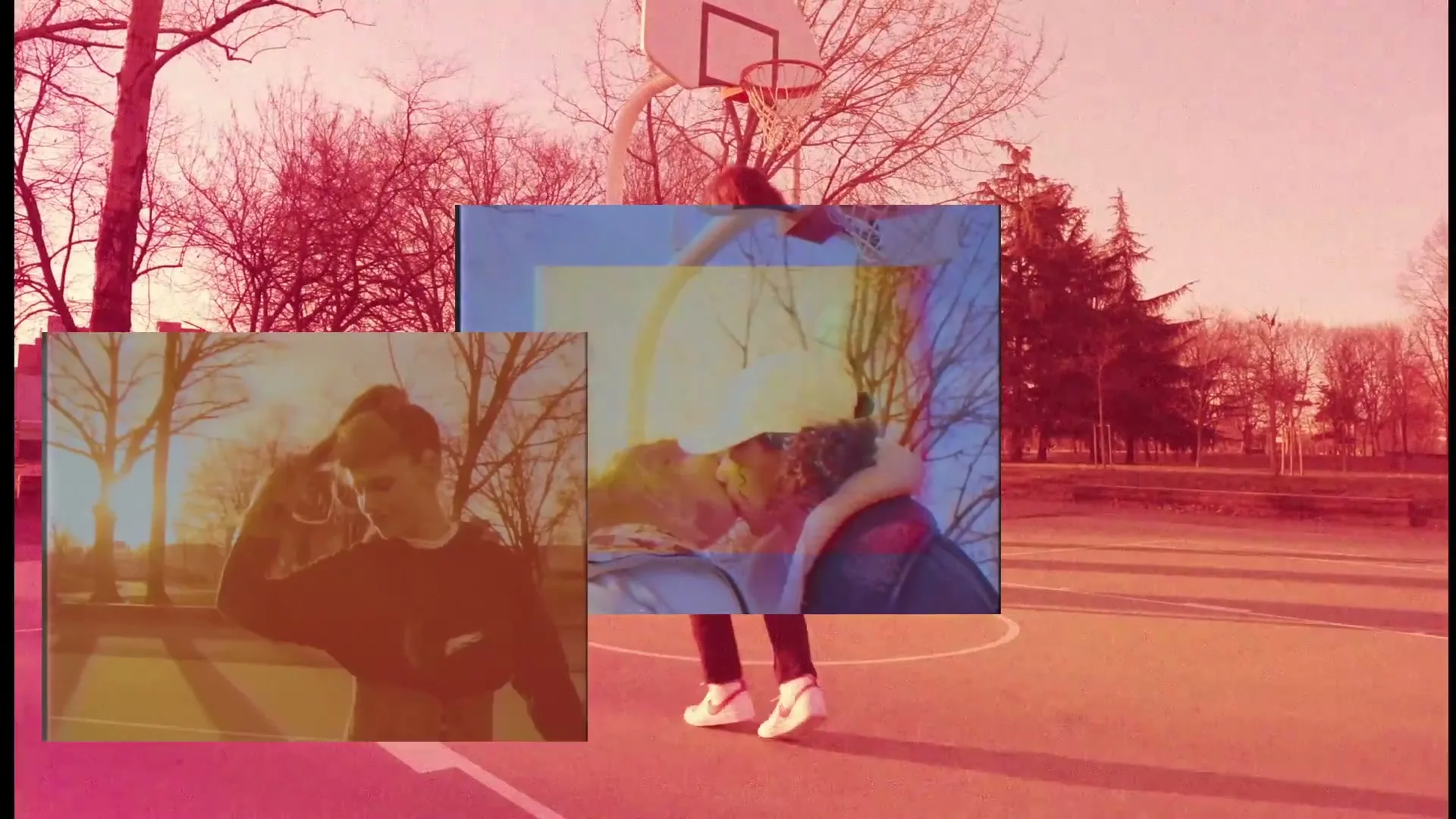 A person stands on a basketball court with two video screens superimposed, one showing a man posing and the other a couple kissing, all with a pink filter.