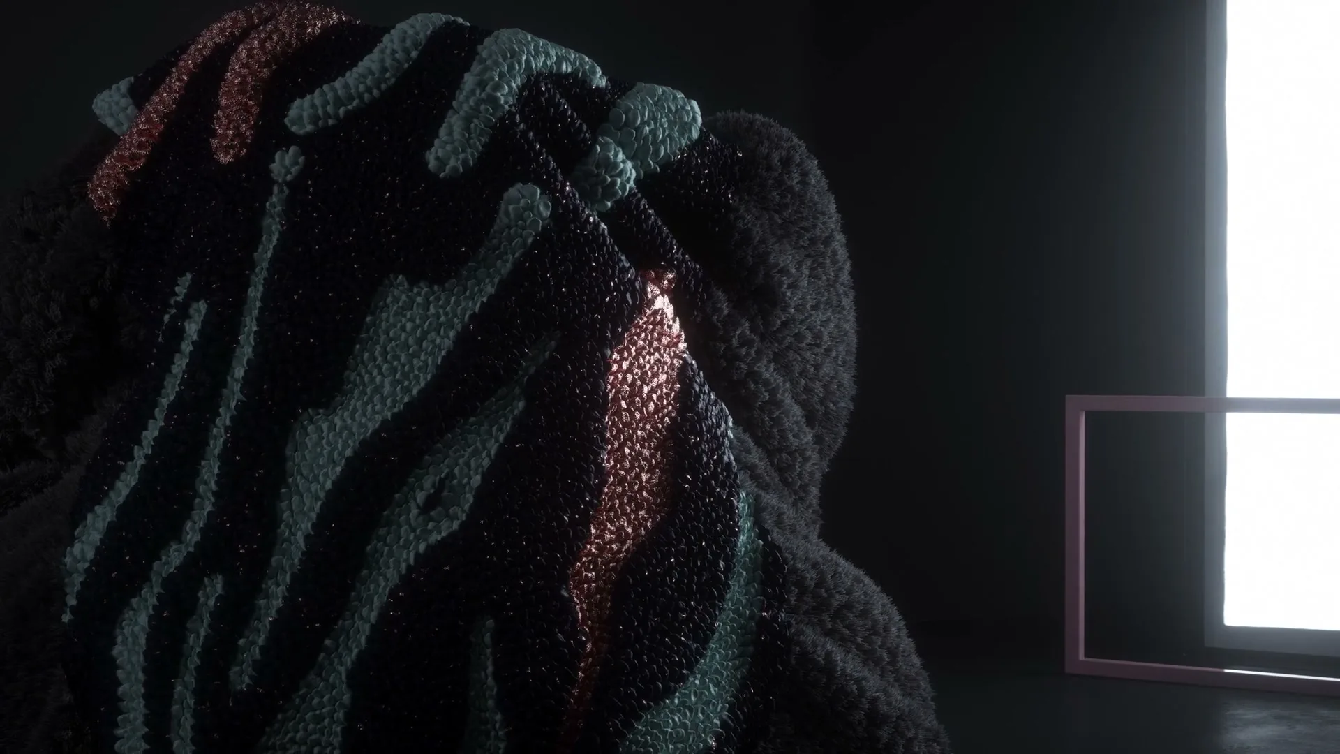 A dark, furry, amorphous blob with a textured, colorful surface on its back, sits in a dark room with a bright white light source and a pink frame on the right.