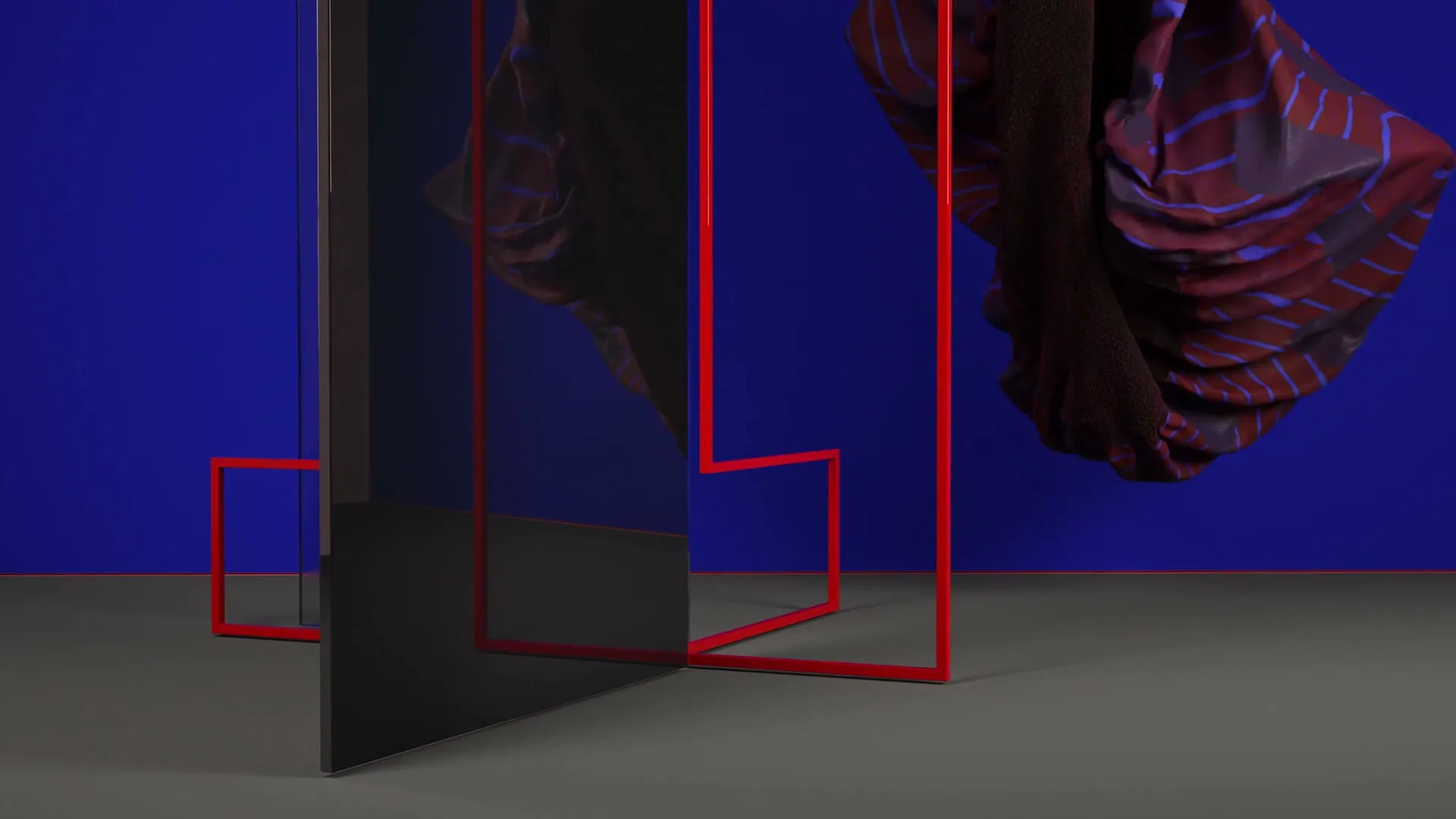 A dark, reflective panel stands upright, surrounded by red geometric outlines, while a textured, purple and red object floats in the upper right against a blue background.