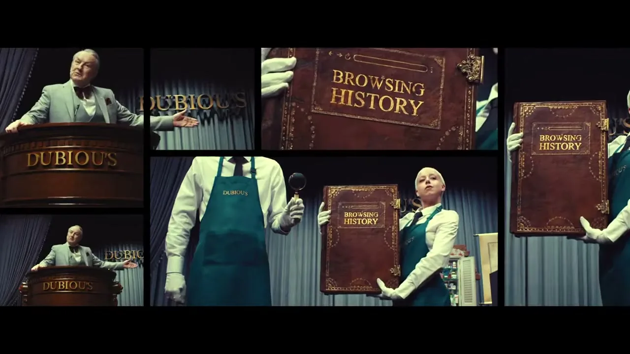 A split-screen shows an auctioneer, a large book titled "BROWSING HISTORY," and an auction assistant holding the book, all in a dramatic, dark auction house setting.