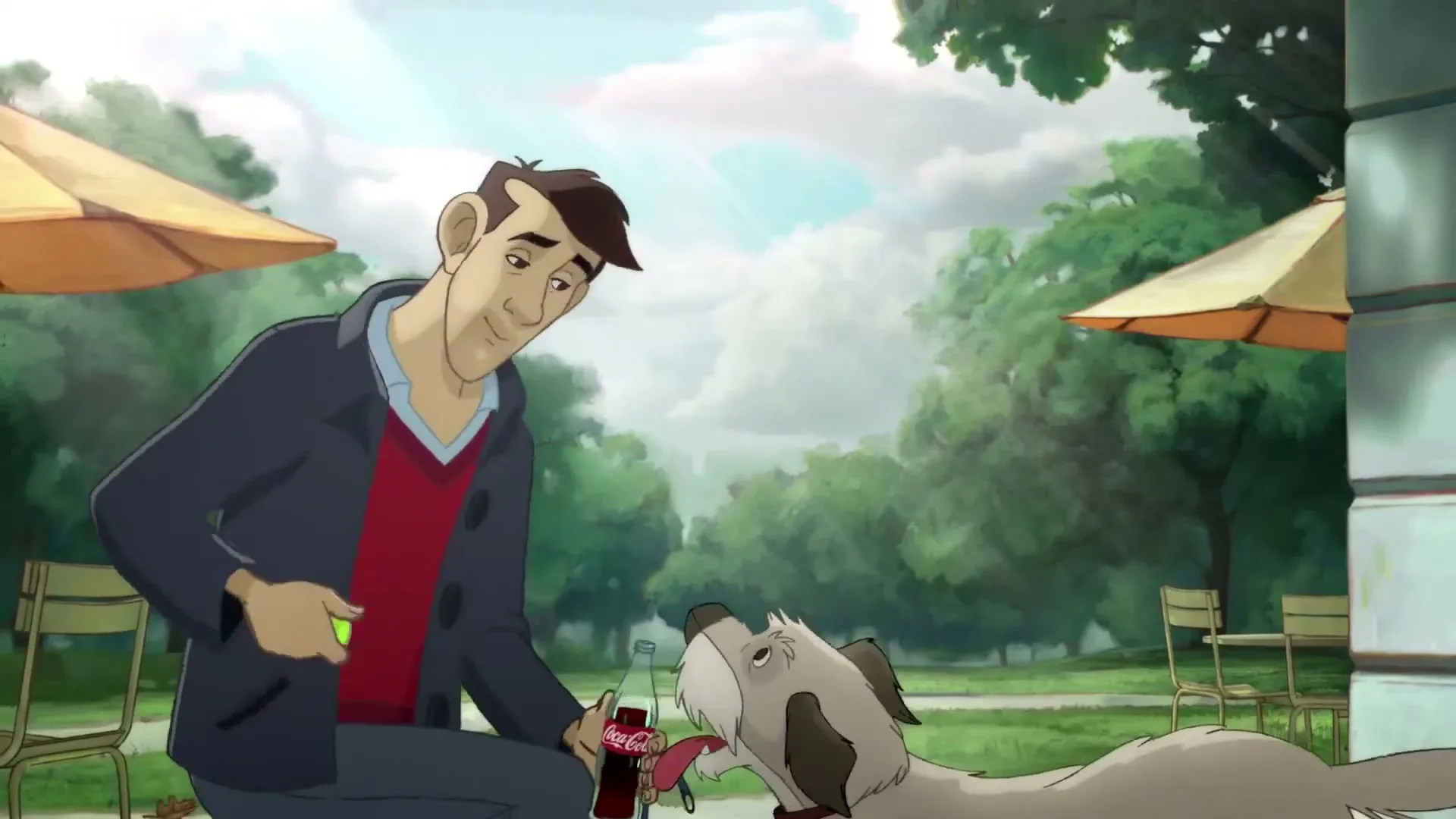 A man in a blue jacket and red shirt offers a Coca-Cola bottle to a dog, then plays with a tennis ball in an outdoor cafe setting.
