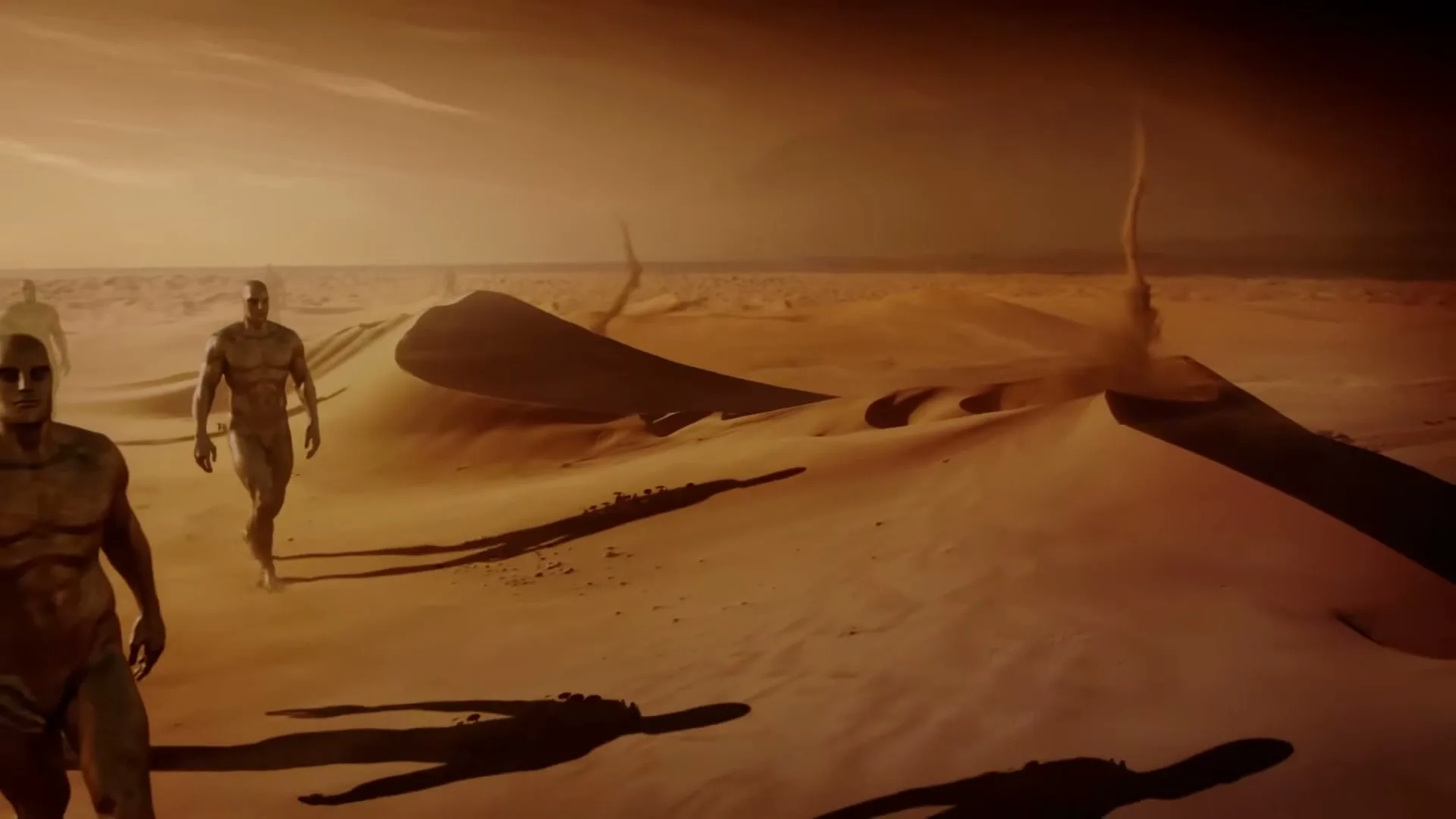 A group of muscular, bald, humanoid figures walk across a vast, sandy desert with large dunes and dust devils under a hazy, orange sky.